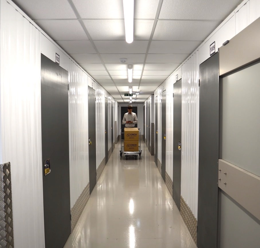 Storage Units to rent in corridor of blue doors
