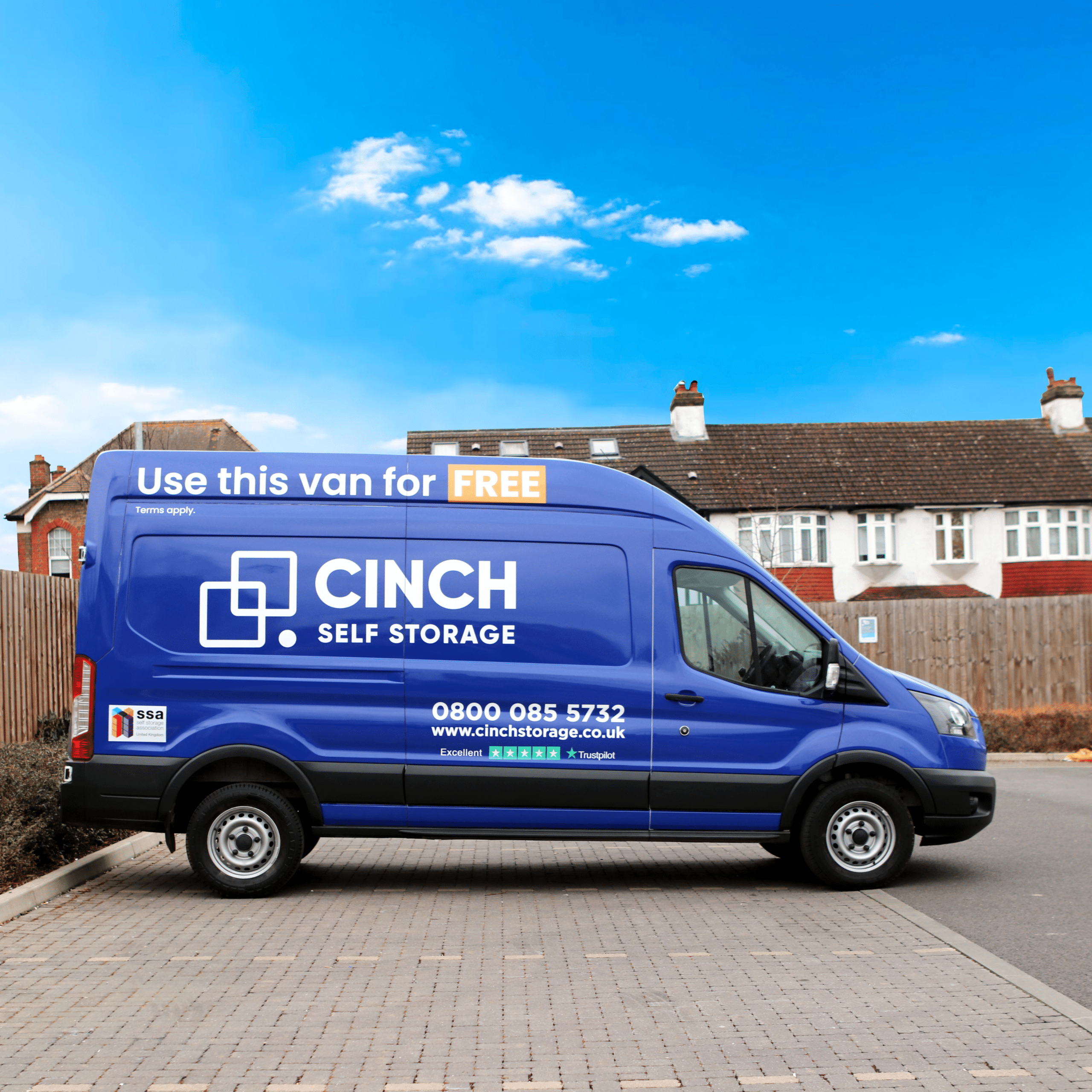 House move storage Gillingham - image shows Cinch Storage van for hire in a parking space with houses and blue sky behind