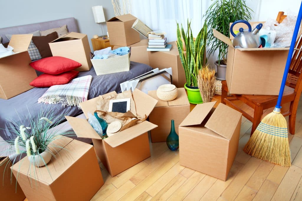 Storage to rent Newbury - image shows a living room filled with boxes packed with household items 