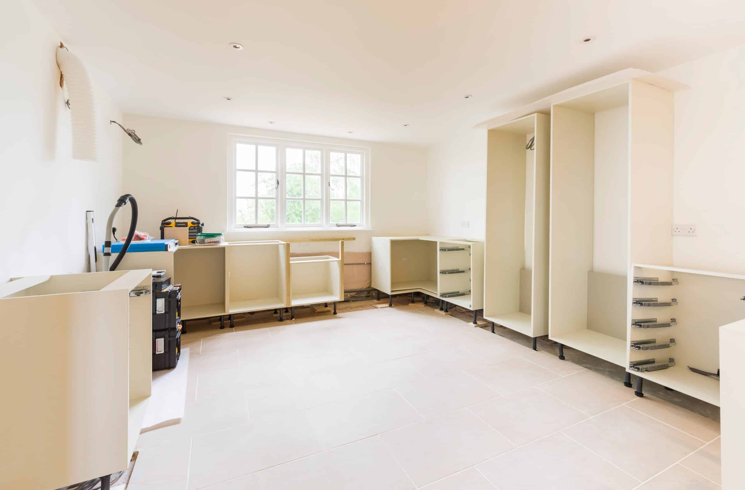 Renovation storage - image shows light and airy kitchen space during renovation with units in place without doors