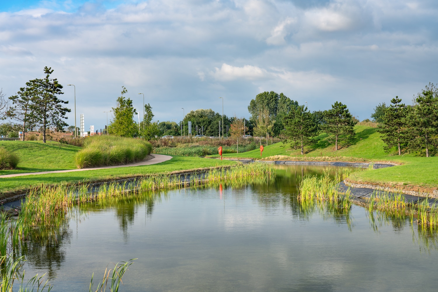 Is Bicester a nice place to live? Image shows a water pond in Bicester town, England.