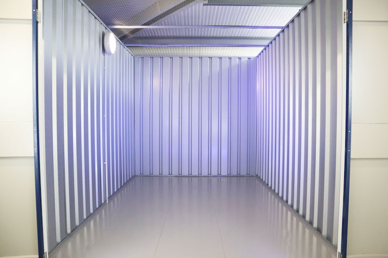 Self storage Vs Warehouse. Image shows an empty internal view of a storage unit.
