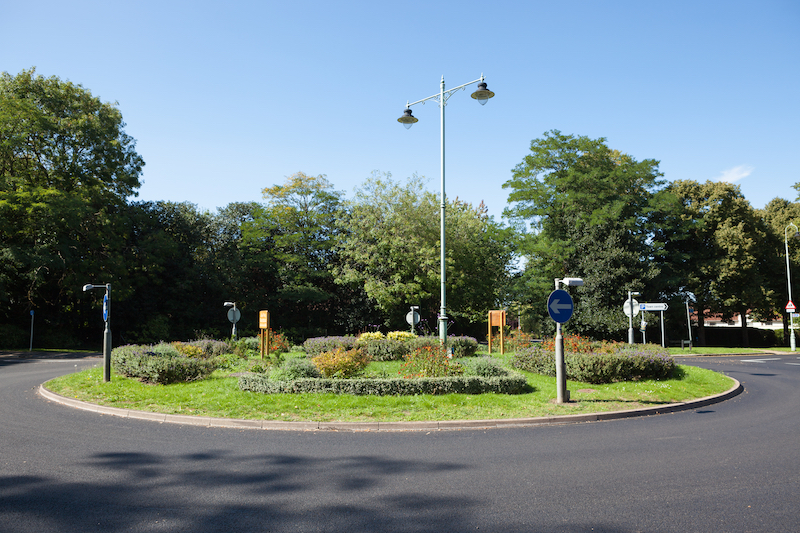 Top things to do in Letchworth Garden City. Your ultimate Guide. Image shows the first roundabout built in Britain, circa 1909, in Letchworth Garden City.