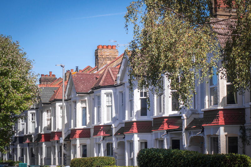 5 Benefits of living in Earlsfield. Image shows a typical row of terraced red brick houses in south west London