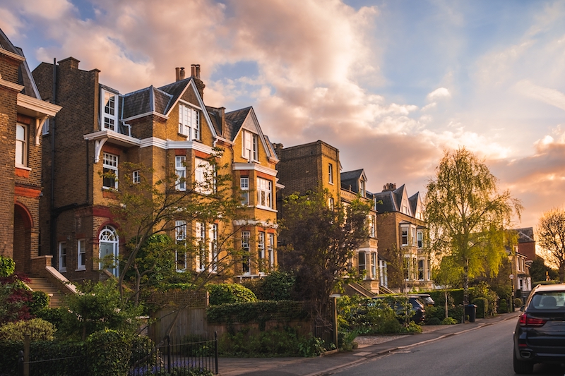 5 Reasons you need self storage in Wimbledon. Image shows a view of traditional residential street at sunset