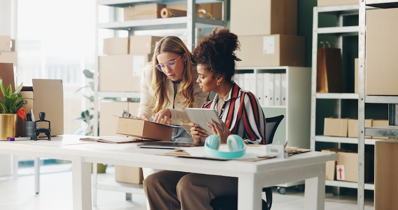 Storage Biddenham. Image shows two women running a business from their storage unit.