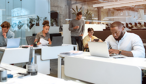 Newmarket office to let. Image shows an office full of people working.