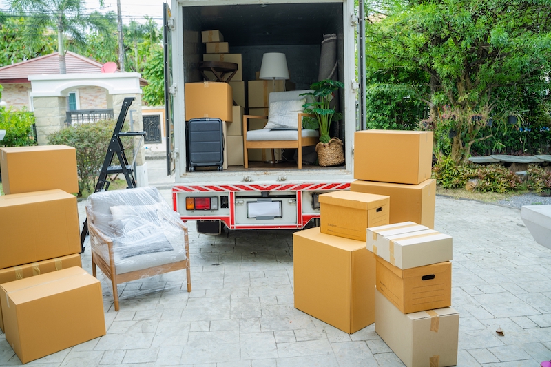 House move storage Swindon. Images shows a van packed with boxes and household items ready to be moved.