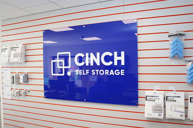 Self storage in Enfield. Image shows reception sign with Cinch Self Storage logo.