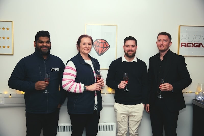 Ruby Reign case study. Image shows the founders and cinch employees enjoying the launch party in their new trade unit at Cinch Self Storage Swindon.