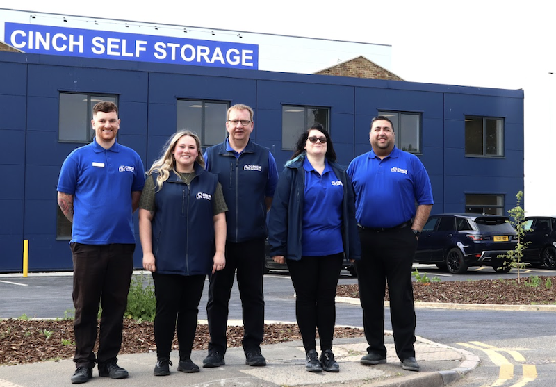 Image shows the Cinch Self Storage Swindon team outside the storage facility.