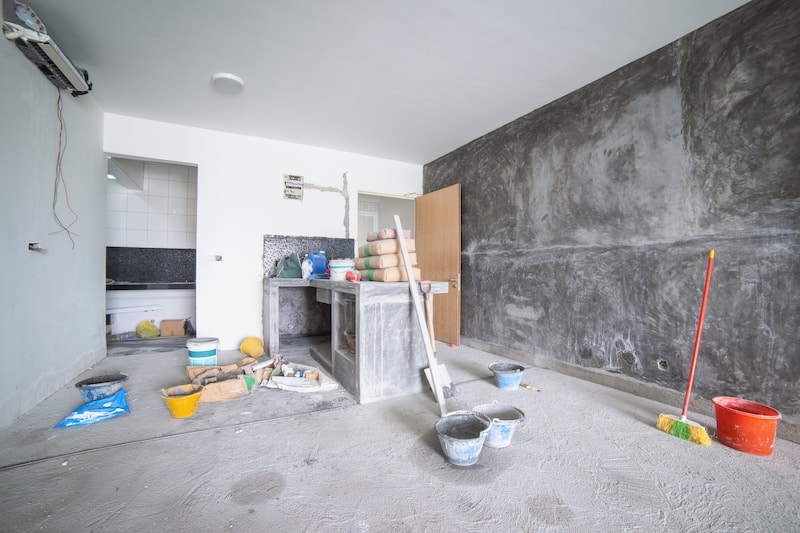 Storage units in Newcastle. Image shows building materials and tools scattered on the floor during a renovation
