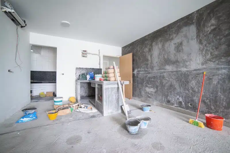 Storage units in Newcastle. Image shows building materials and tools scattered on the floor during a renovation