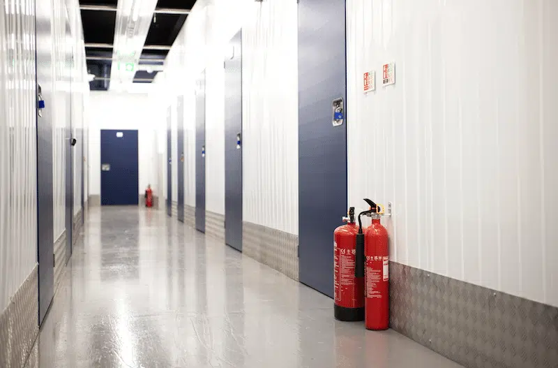 Secure self storage in Southend. Image shows an internal corridor view with blue doors to storage units in Southend.