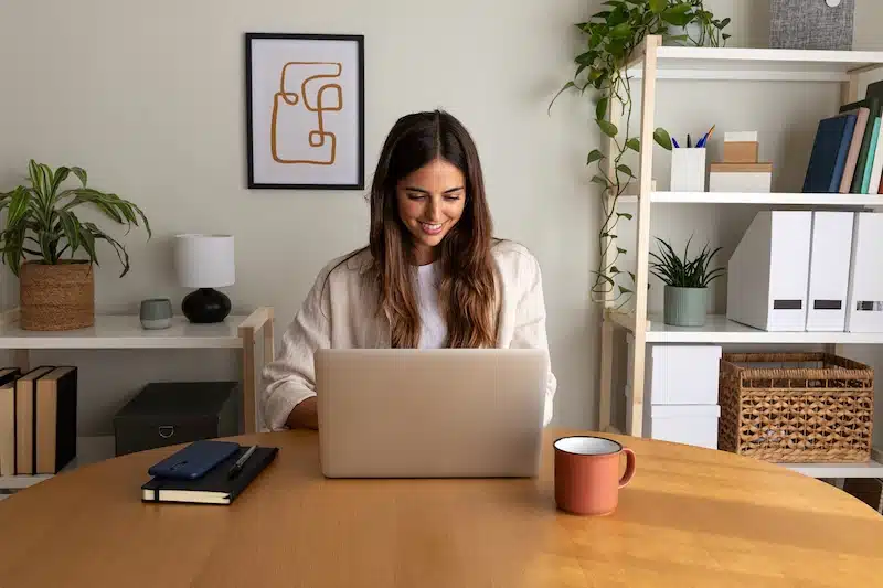 Storage unit in Exeter. Image shows a young woman in her home office. 