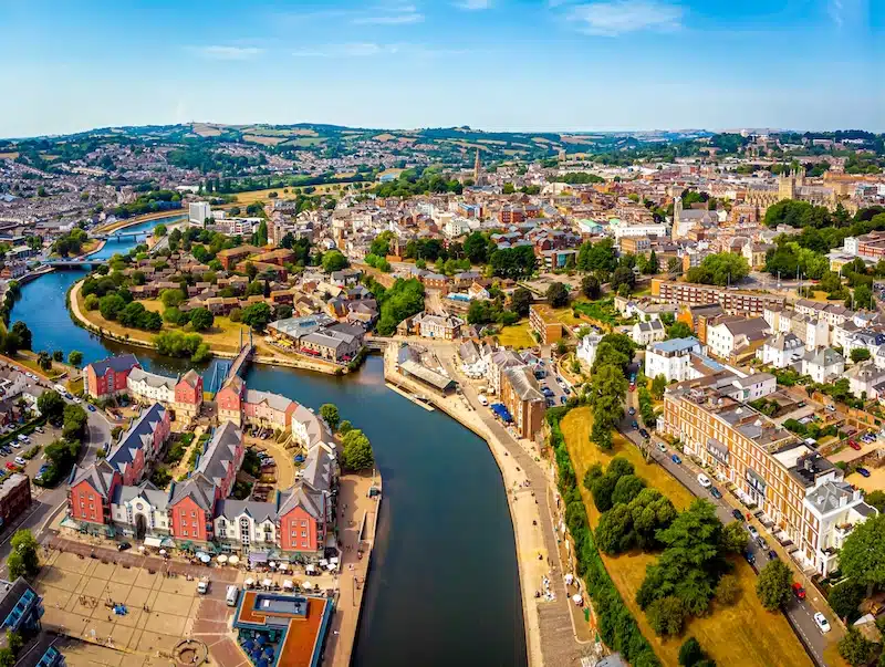 Storage units to rent Exeter. Image shows  an aerial view of Exeter during a summer's day. 